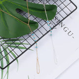 bijou de main bleu perlé