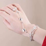 chaine de main papillons manchette argenté