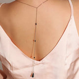 collier de dos argente perles noires