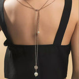 collier de dos pendentif medaillon et perle