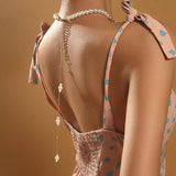 collier de dos trio de perles nacrées