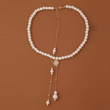 sautoir de dos trio de perles nacrées