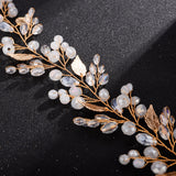 Head jewelry with white pearls and gold-colored leaves
