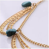 Gold head jewelry with blue stone pendants